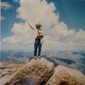 Mom waving from atop Longs Peak