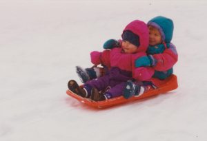 Little girls on sled
